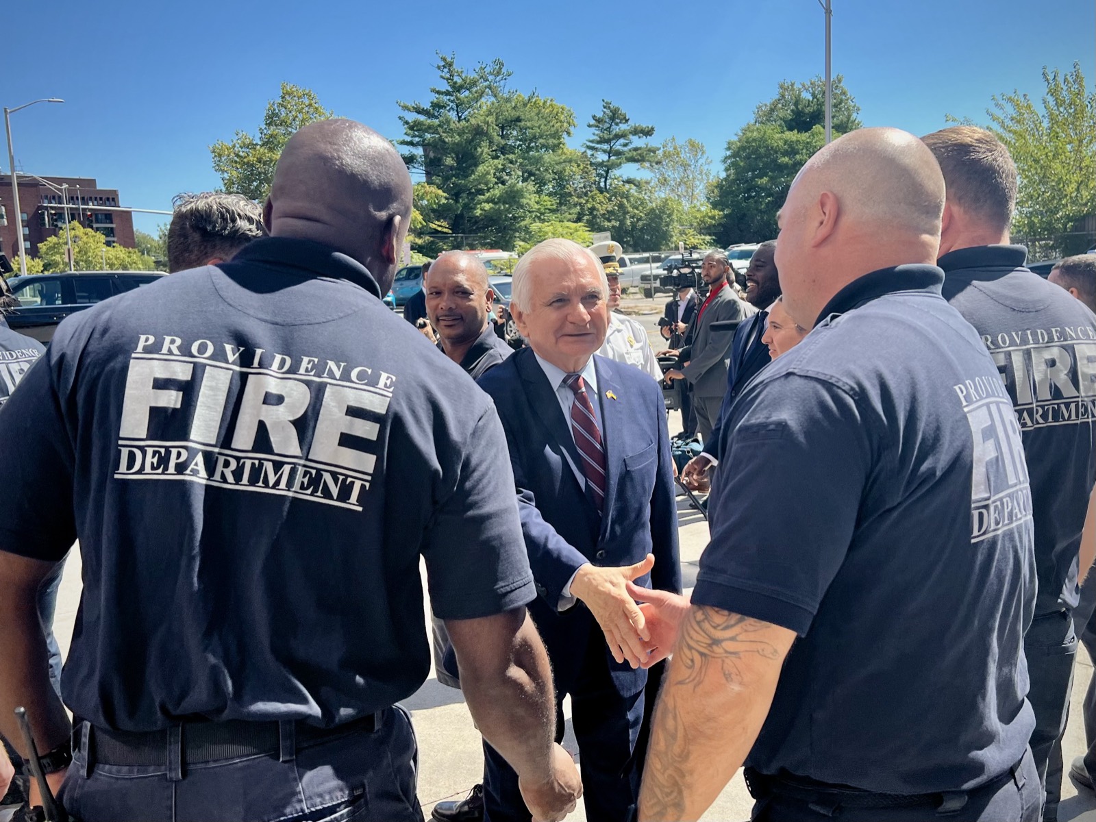 Jack Reed greeting Providence firefighters